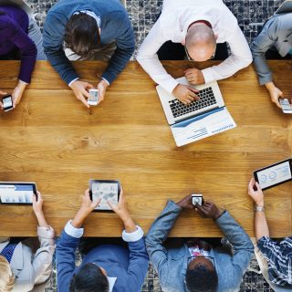 tech users round a table