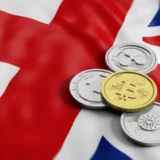 UK cryptocurrency: Crypto Coins on British flag.