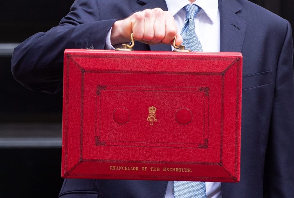 Jeremy Hunt during Autumn Statement holding traditional red briefcase