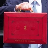 Jeremy Hunt during Autumn Statement holding traditional red briefcase